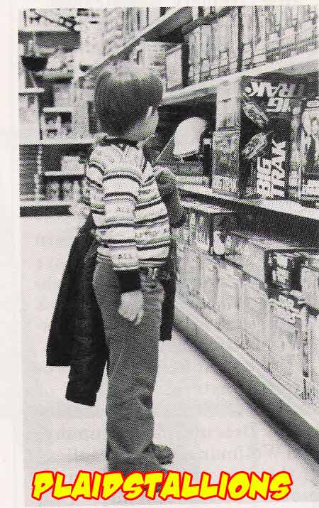 a child looking at Kenner Star wars Product in 1980
