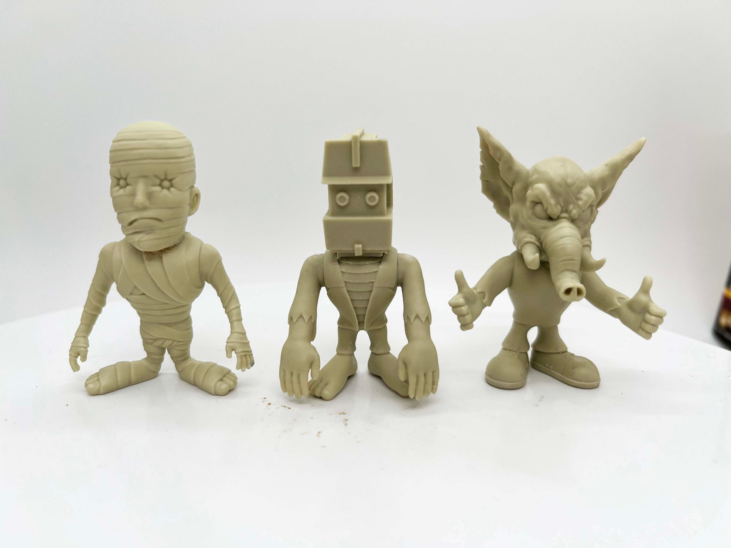 Additional images mixed in the White Elephant Toyz "Grave Yard Geeks" figures.