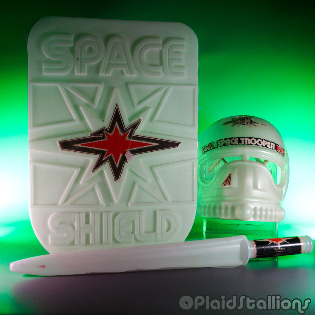 I realized I havne't documented completing the glow-in-the-dark trinity of Space Sword, Space Shield, and Space Trooper Helmet by Toy Box Inc.

Meant to cash in on Star Wars, these wonderful toys were somehow better than what Kenner offered in terms of light sabers. 

I  had the shield and sword as a kid (via @canadiantire), and they were the best, but I never got that helmet. My pal @peterjoek gifted me one this fall, and well, it's about time I showed them off!

#starwars #toyventures #starwarsknockoff #spacesword #spaceshield #glowinthedark #bootlegstarwars #plaidstallions 